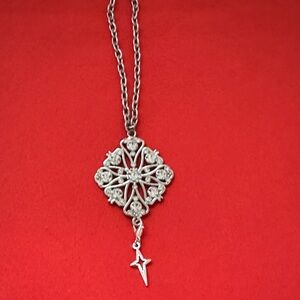 Elegant Silver Tone Pendant Necklace 19” with out the ext. Can change the charm